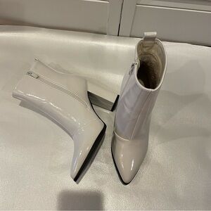 Sleek White Ankle Booties with Pointed Toe and High Heel